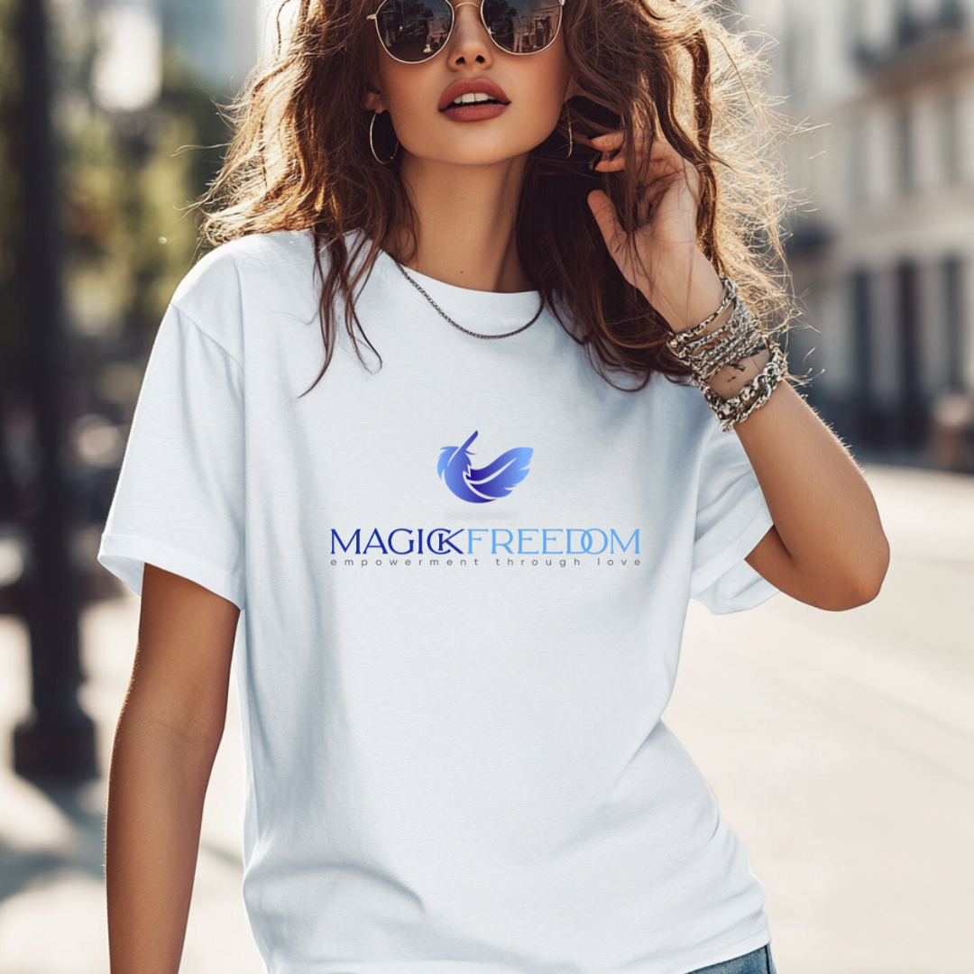 Model wearing Magick Freedom Feather Logo, crew neck, short sleeve T-shirt that says 
‘Magick Freedom’ across the chest, ‘empowerment through love’ underneath and the feather above. Authenticity, courage, magick!
