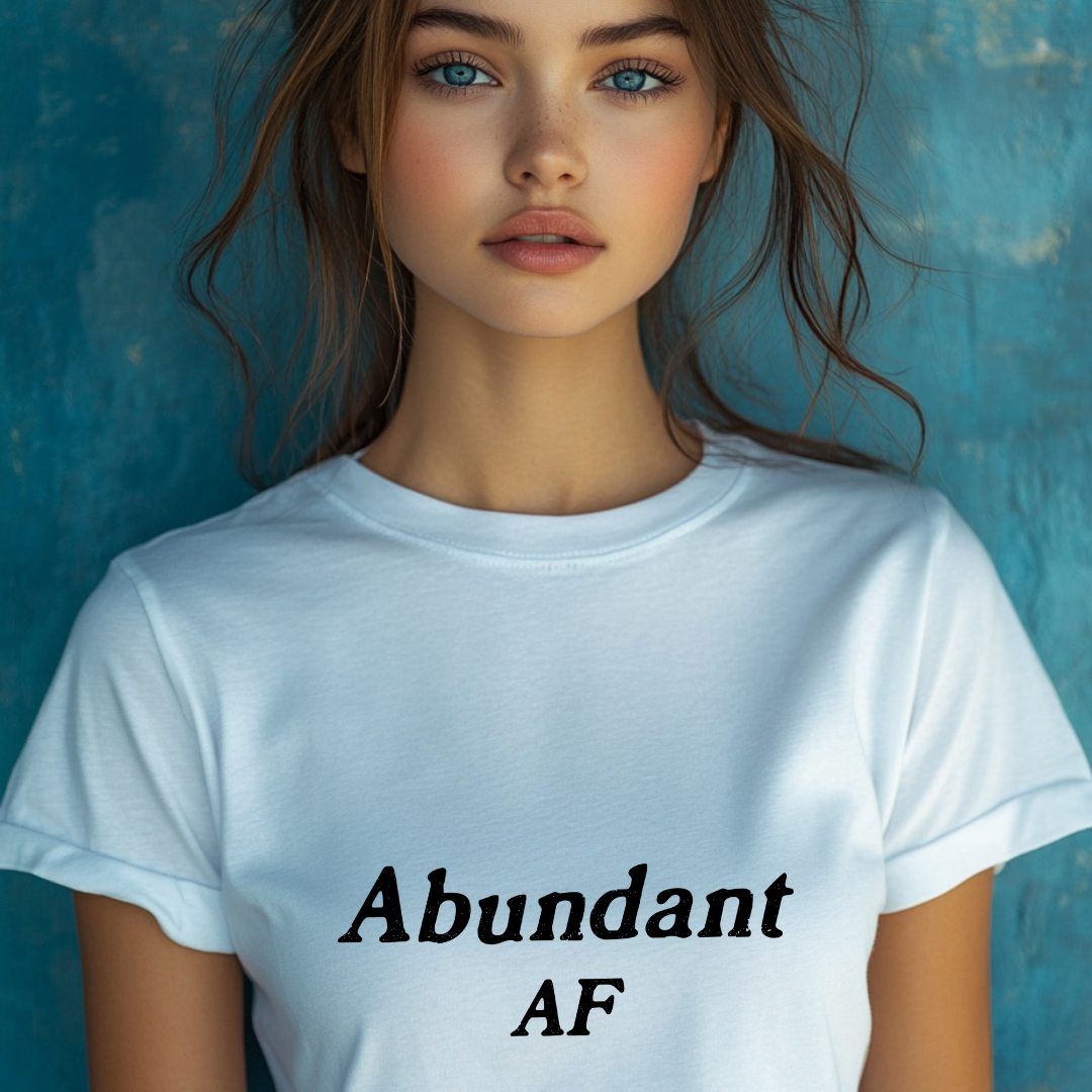 Model wearing a crew neck t-shirt with Abundant AF printed in block letters and centered on the chest.
Wear it, own it, live it.