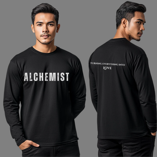 Model wearing crew neck long sleeve T-shirt that reads ALCHEMIST in distressed block letters across the chest. "Turning Everything Into Love" in two lines of smaller block letters is written on the back.
Embody love in all things.
