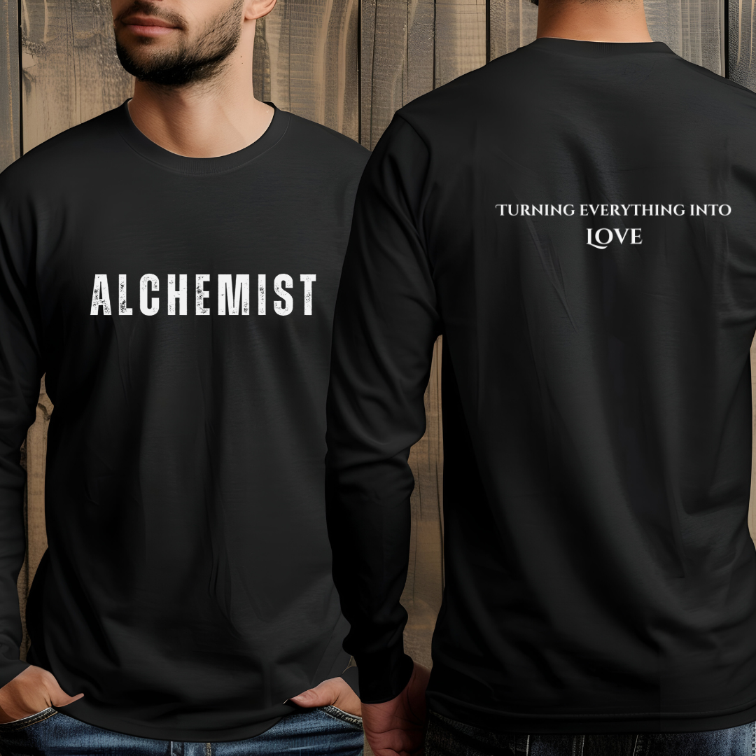 Model wearing crew neck long sleeve T-shirt that reads ALCHEMIST in distressed block letters across the chest. "Turning Everything Into Love" in two lines of smaller block letters is written on the back.
Embody love in all things.