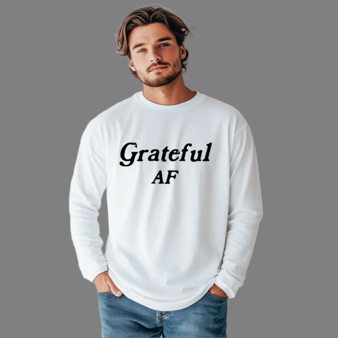Model wearing a crew neck, long sleeve T-shirt with Grateful AF printed in block letters and centered on the chest.
Wear it, own it, live it.