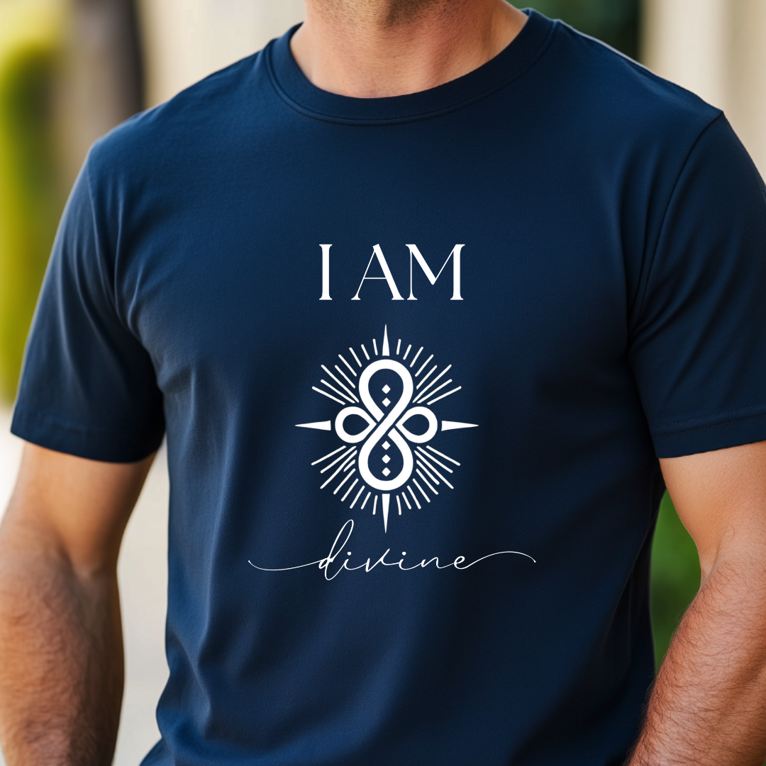 Model wearing a crew neck T-shit with symbolic sigil centered on the chest, representing divine.
The shirt reads 'I AM' in block font above the sigil and 'divine' in script font below the sigil.
Declare to the world: I AM divine.