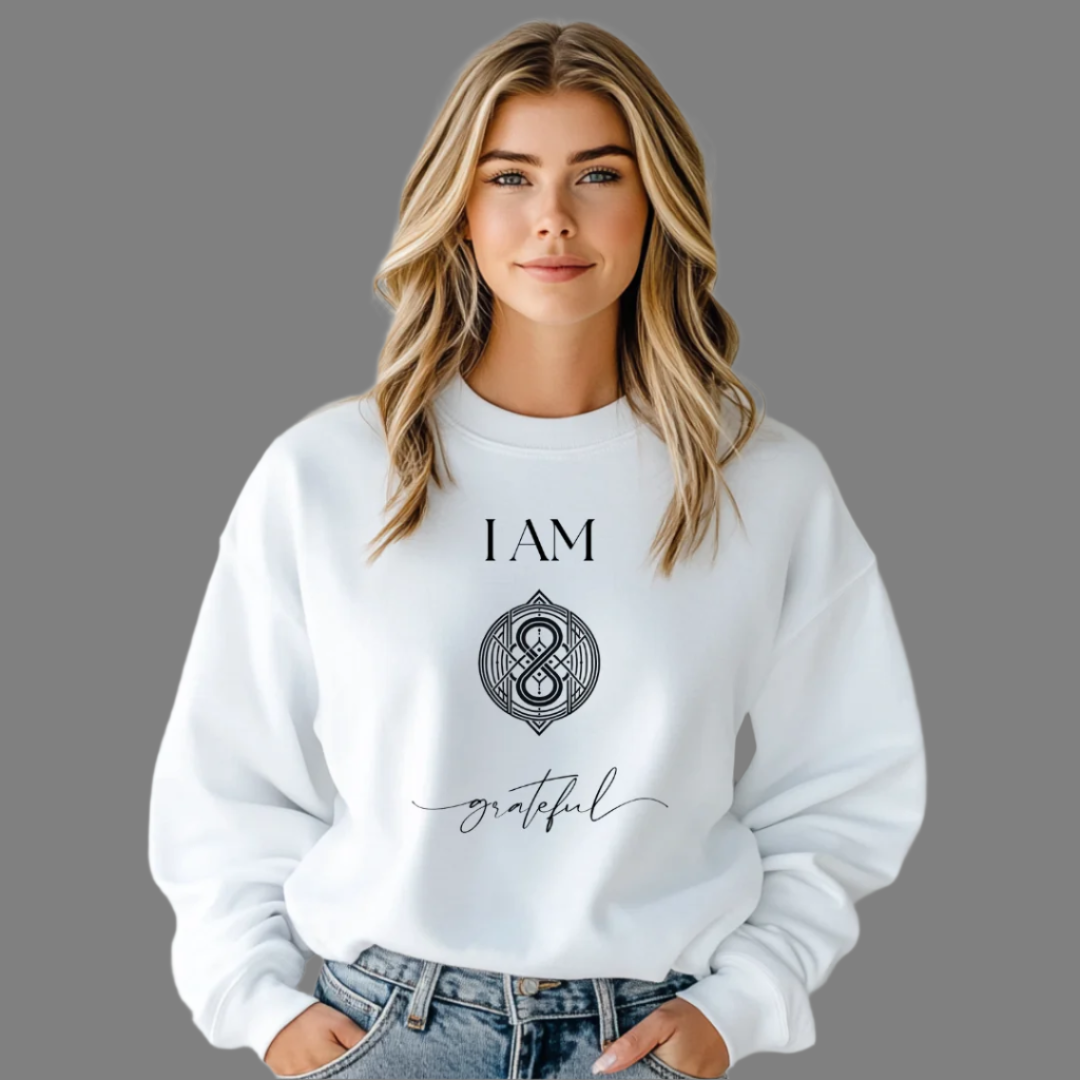 Model wearing a crew neck sweatshirt   with symbolic sigil centered on the chest, representing grateful.
The shirt reads 'I AM' in block font above the sigil and 'grateful' in script font below the sigil.
Declare to the world: I AM Grateful.


