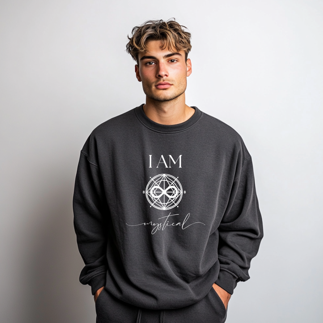Model wearing a crew neck sweatshirt with symbolic sigil centered on the chest, representing mystical.
The shirt reads 'I AM' in block font above the sigil and 'mystical' in script font below the sigil.
Declare to the world: I AM mystical.