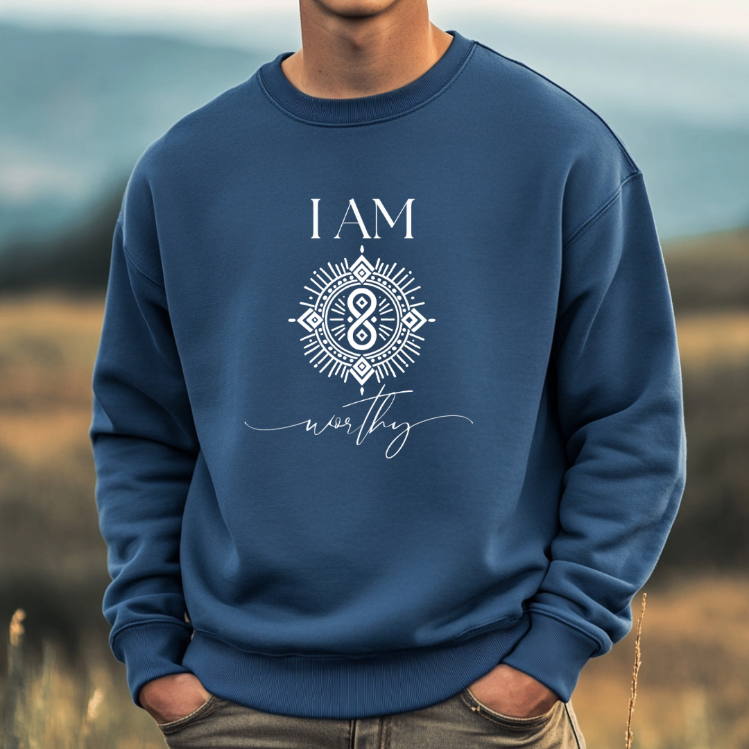 Model wearing a crew neck sweatshirt with symbolic sigil centered on the chest, representing worthy.
The shirt reads 'I AM' in block font above the sigil and 'worthy' in script font below the sigil.
Declare to the world: I AM worthy.
