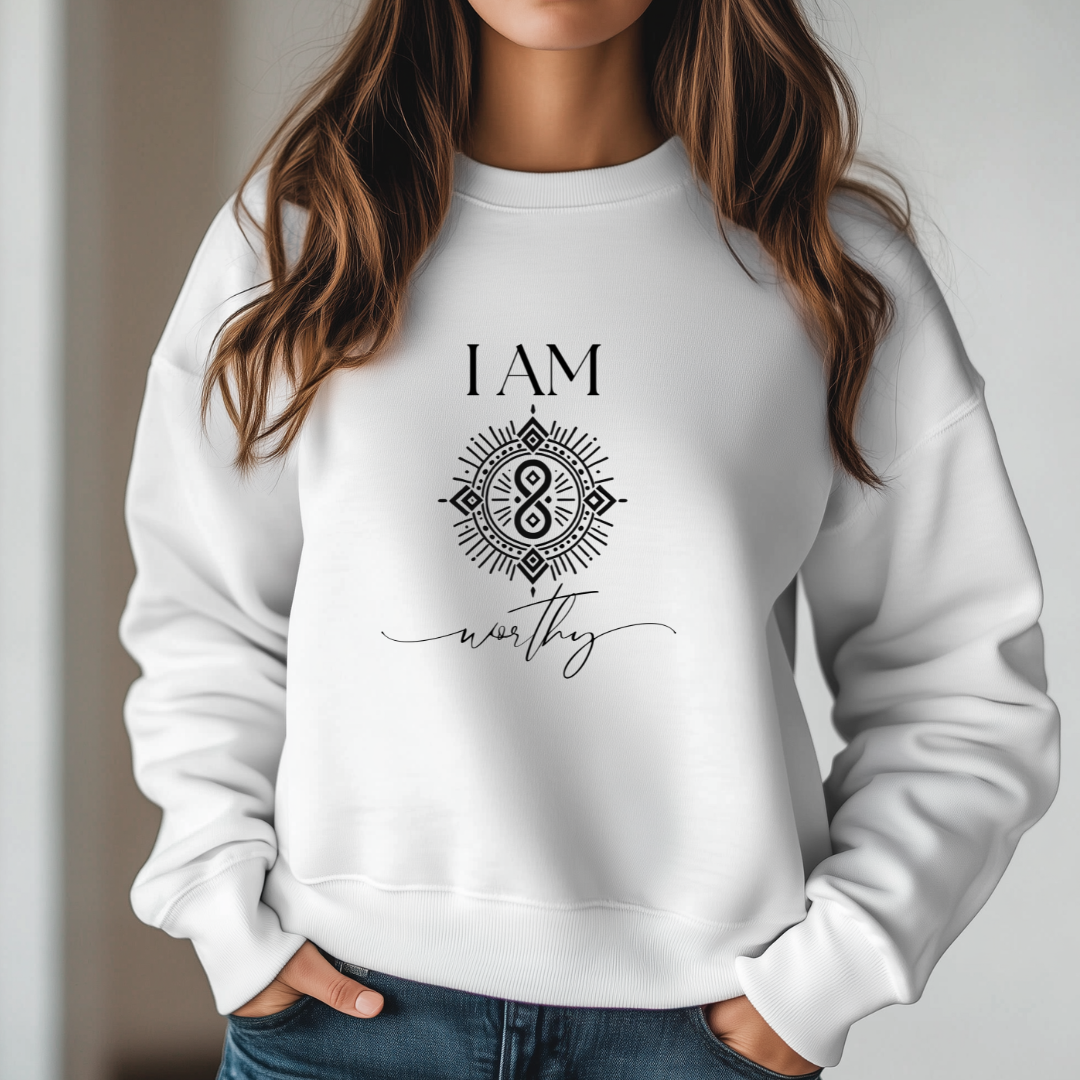Model wearing a crew neck sweatshirt with symbolic sigil centered on the chest, representing worthy.
The shirt reads 'I AM' in block font above the sigil and 'worthy' in script font below the sigil.
Declare to the world: I AM worthy.