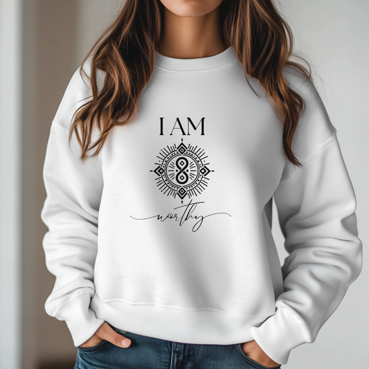 Model wearing a crew neck sweatshirt with symbolic sigil centered on the chest, representing worthy.
The shirt reads 'I AM' in block font above the sigil and 'worthy' in script font below the sigil.
Declare to the world: I AM worthy.