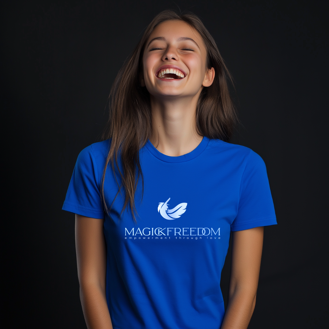 Model wearing Magick Freedom Feather Logo, crew neck, short sleeve T-shirt that says 
‘Magick Freedom’ across the chest, ‘empowerment through love’ underneath and the feather above. Authenticity, courage, magick!
