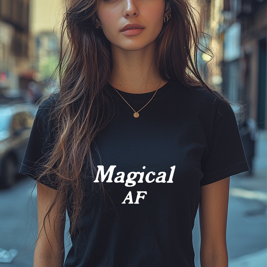 Model wearing a crew neck t-shirt with Magical AF printed in block letters and centered on the chest.
Wear it, own it, live it.
