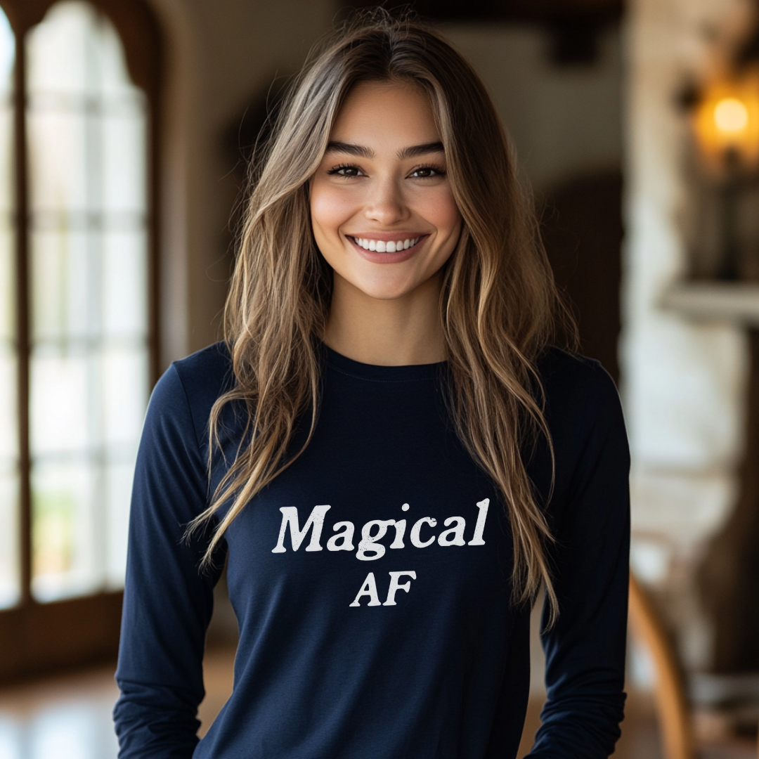 Model wearing a crew neck, long sleeve T-shirt with Magical AF printed in block letters and centered on the chest.
Wear it, own it, live it
