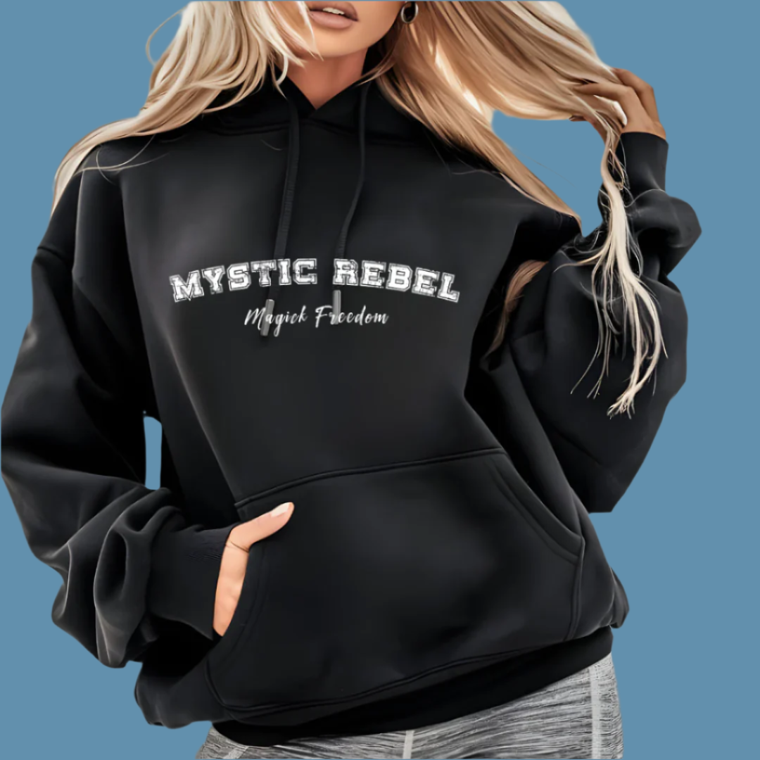 Model wearing a hoodie that reads Mystic Rebel in university font, arched across the chest with Magick Freedom in scripted font below.
Unleash your wild, untamed spirit!
