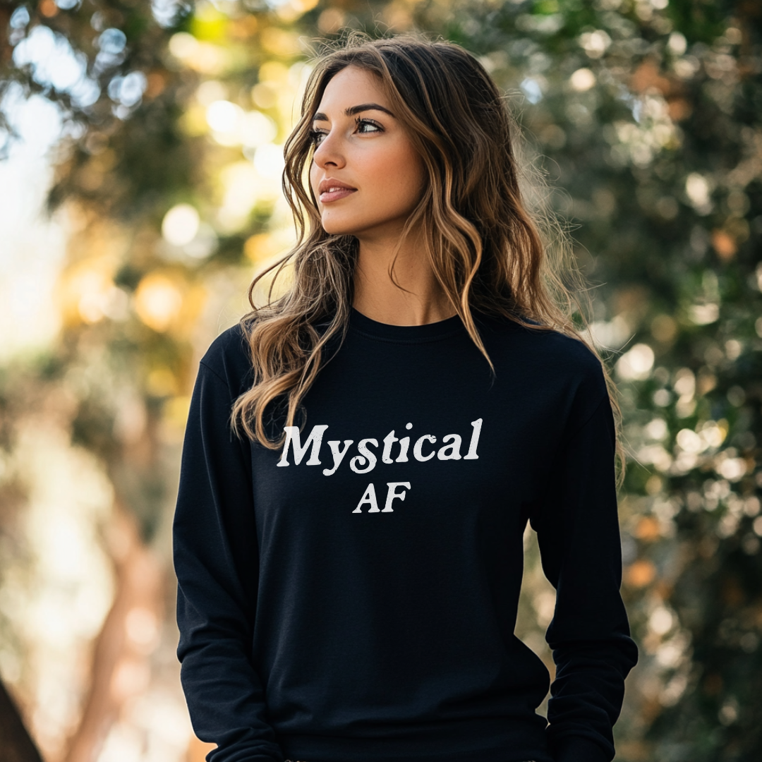 Model wearing a crew neck, long sleeve T-shirt with Mystical AF printed in block letters and centered on the chest.
Wear it, own it, live it.