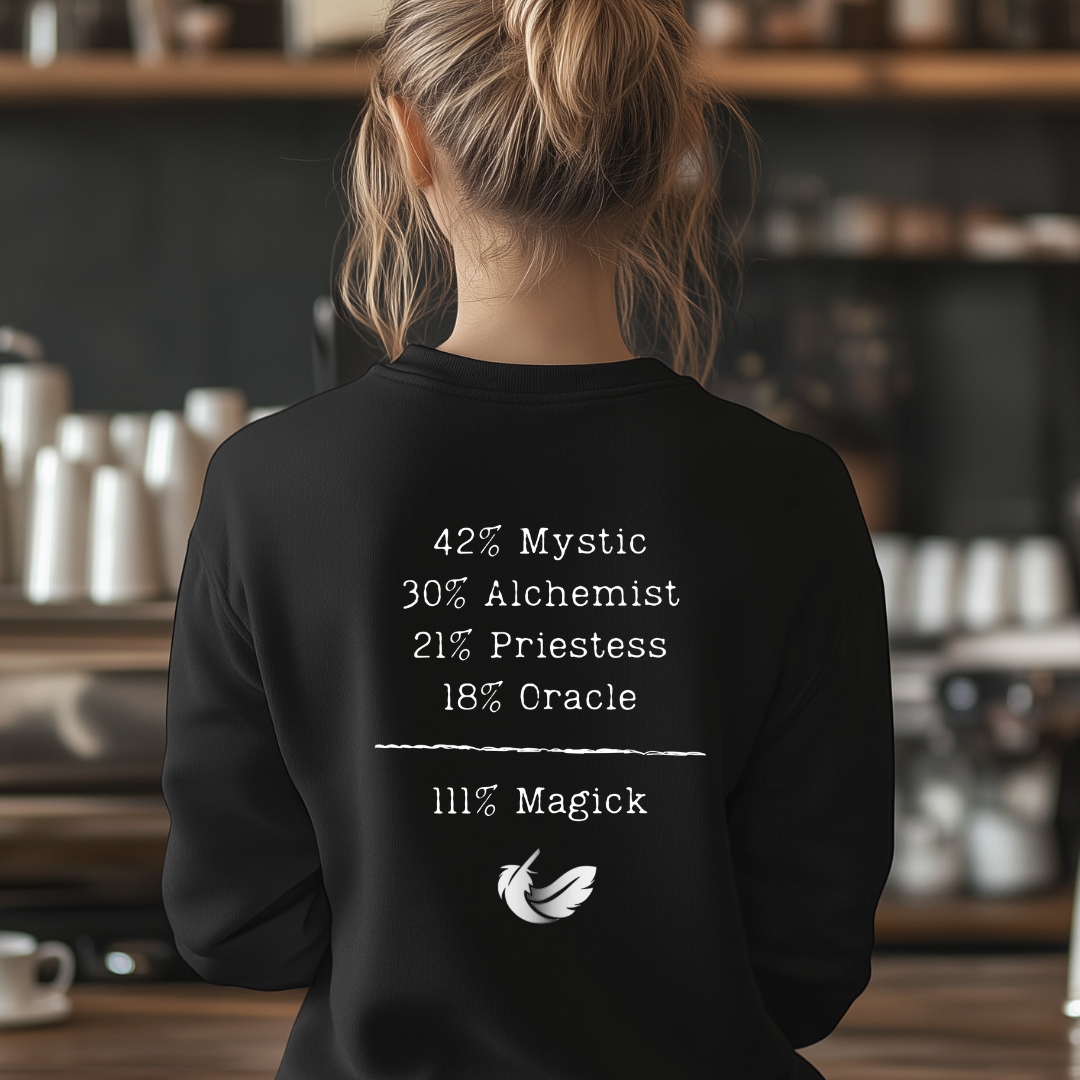 Model wearing a crew neck, 111% Magick sweatshirt. 
On the front left chest area is the Magick Freedom feather logo. 
The back of the shirt displays a breakdown of mystical archetypes, listing "42% Mystic, 30% Alchemist, 21% Priestess, 18% Oracle," followed by a line and the phrase "111% Magick".