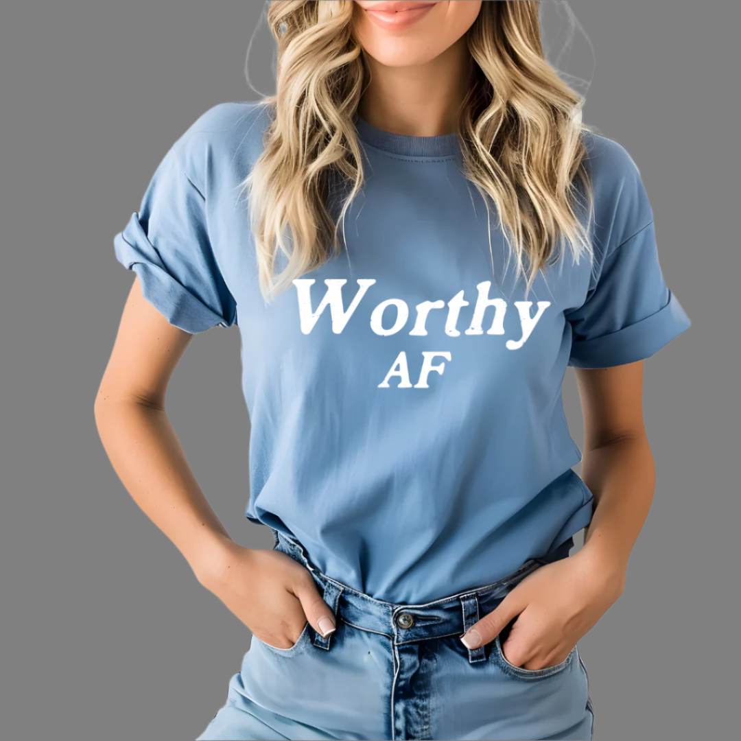 Model wearing a crew neck t-shirt with Worthy AF printed in block letters and centered on the chest.
Wear it, own it, live it.