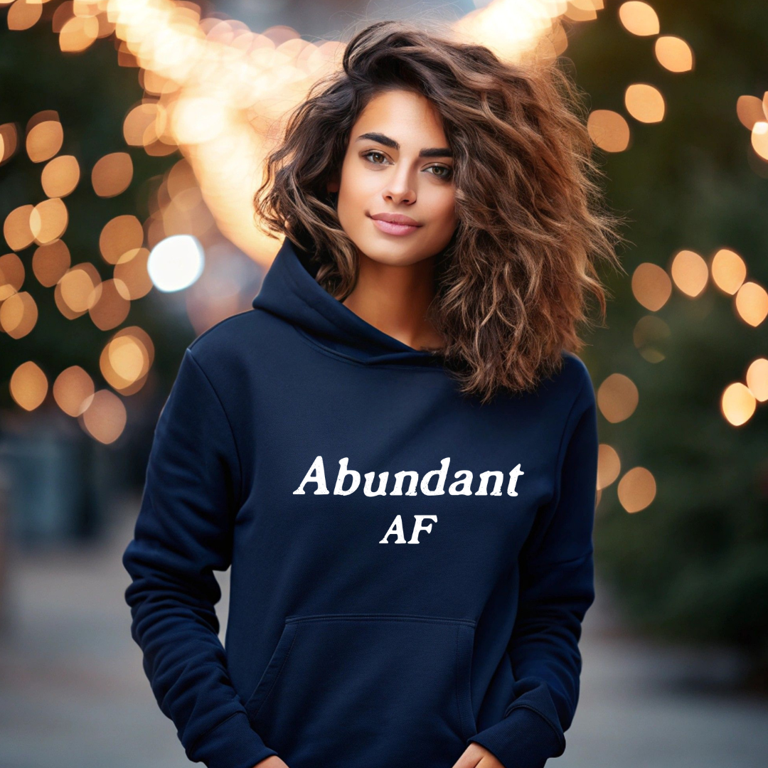 Model wearing a hoodie with Abundant AF printed in block letters and centered on the chest.
Wear it, own it, live it.