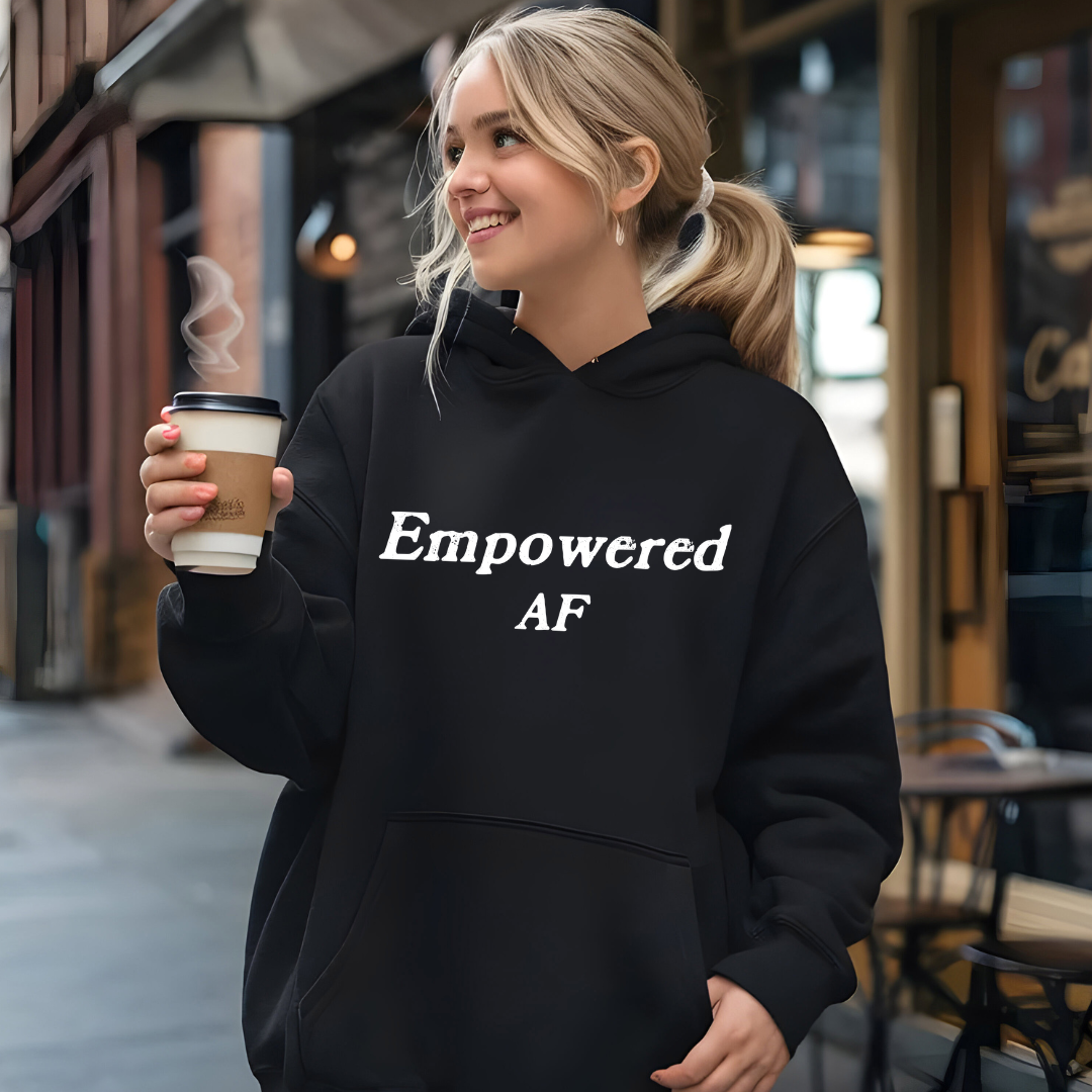 Model wearing a hoodie with Empowered AF printed in block letters and centered on the chest.
Wear it, own it, live it.