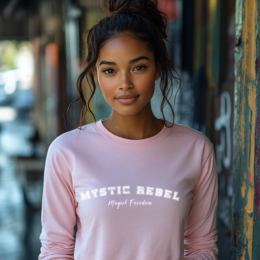 Model wearing a crew neck, long sleeve t-shirt that reads Mystic Rebel in university font, arched across the chest with Magick Freedom in scripted font below.
Unleash your wild, untamed spirit!
