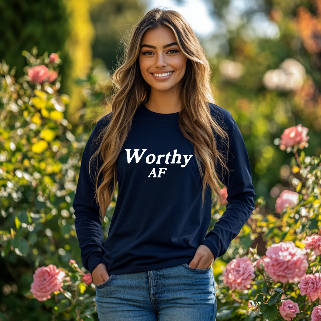 Model wearing a crew neck, long sleeve T-shirt with Worthy AF printed in block letters and centered on the chest.
Wear it, own it, live it.