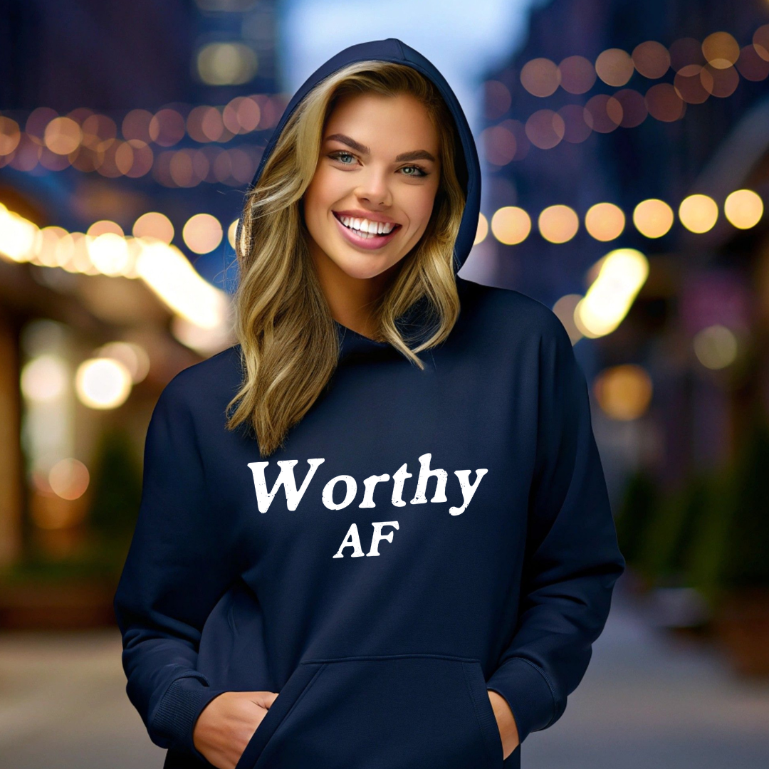 Model wearing a hoodie with Worthy AF printed in block letters and centered on the chest.
Wear it, own it, live it.